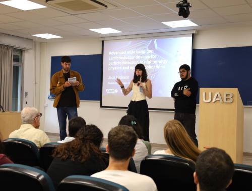 Ferran Pujol, Carla Riera Llobet and Leo Salgado presenting the Young Researchers Day 2025 at UAB