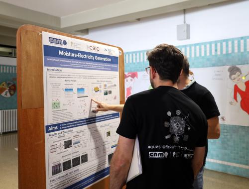 Carlos Carbonell presenting his poster at the poster' session in UAB for the YRD2025