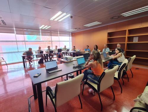 People around a table in the kick-off meeting of the Photonics Chips Competence Center in Valencia